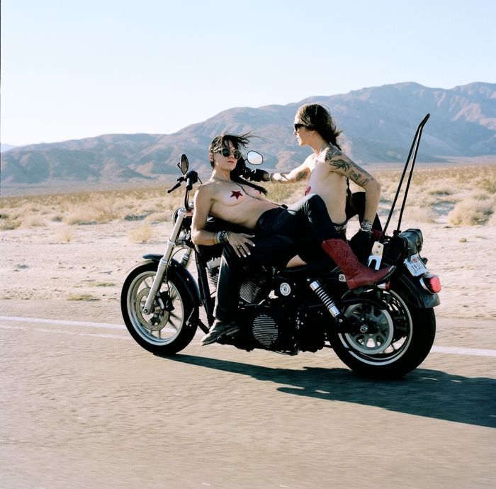 Girls on a motorcycle in Inkou