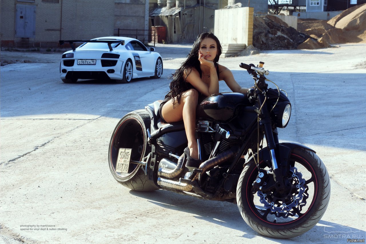 Sexy model Brunettes on a motorcycle in Inkou